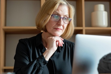 Person looking at computer monitor