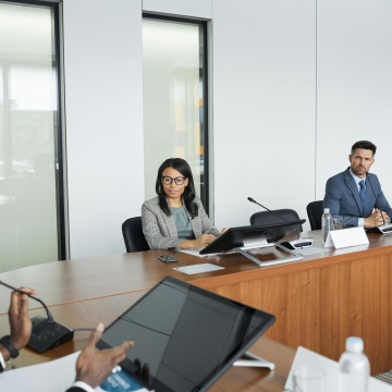 People sitting at a conference table