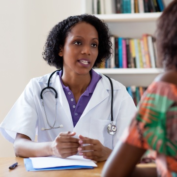 Doctor talking with a patient.