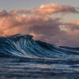 A rogue wave crashes in the ocean